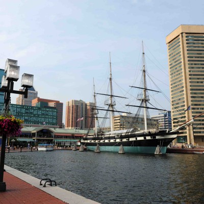 Baltimore Harbor with the USS Constellation. Photo via dollarstockphoto.com